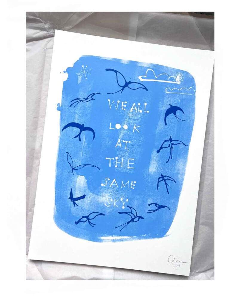 Caroline Tomlinson edition 'We all look at the same sky' edition 50. Two colour screen print by Caroline Tomlinson inspired by the belonging and freedom Two colour hand printed silkscreen A2 sized print.Sky blue background and yves klein blue.