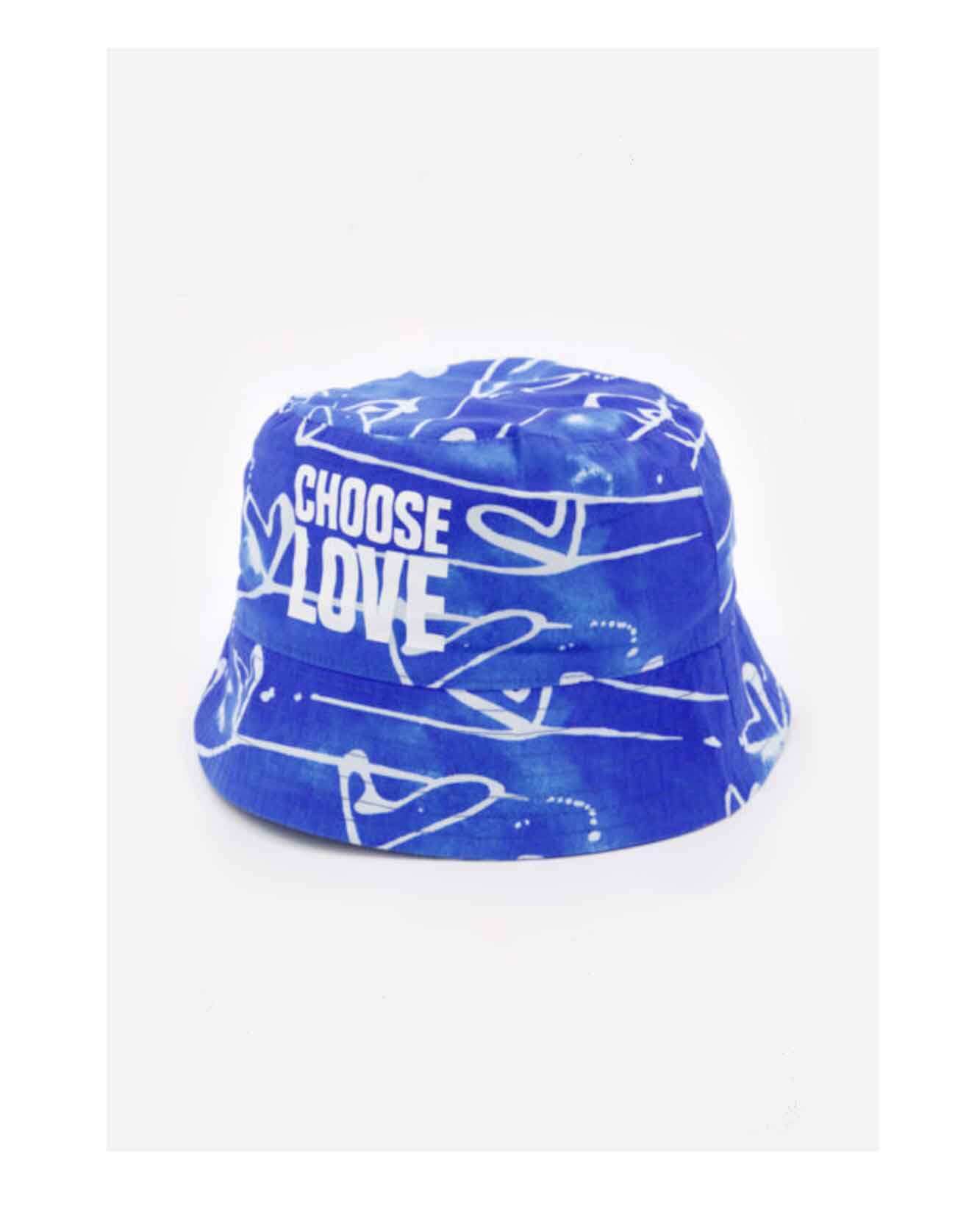 Illustrated patterned blue bucket hat as part of a range of merchandise for CHOOSE LOVE charity in collaboration with TK Maxx and Print Club London. Repeat pattern of linear love hearts with a watercolour gradient ink background. Blue ink background.