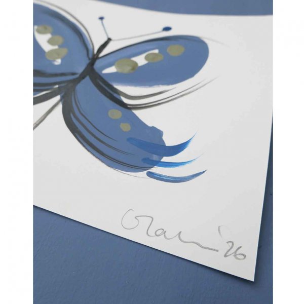 Original A5 butterfly painting in blue acrylic with taupe dot detail by London mixed media artist Caroline Tomlinson, 2026. Detail 3