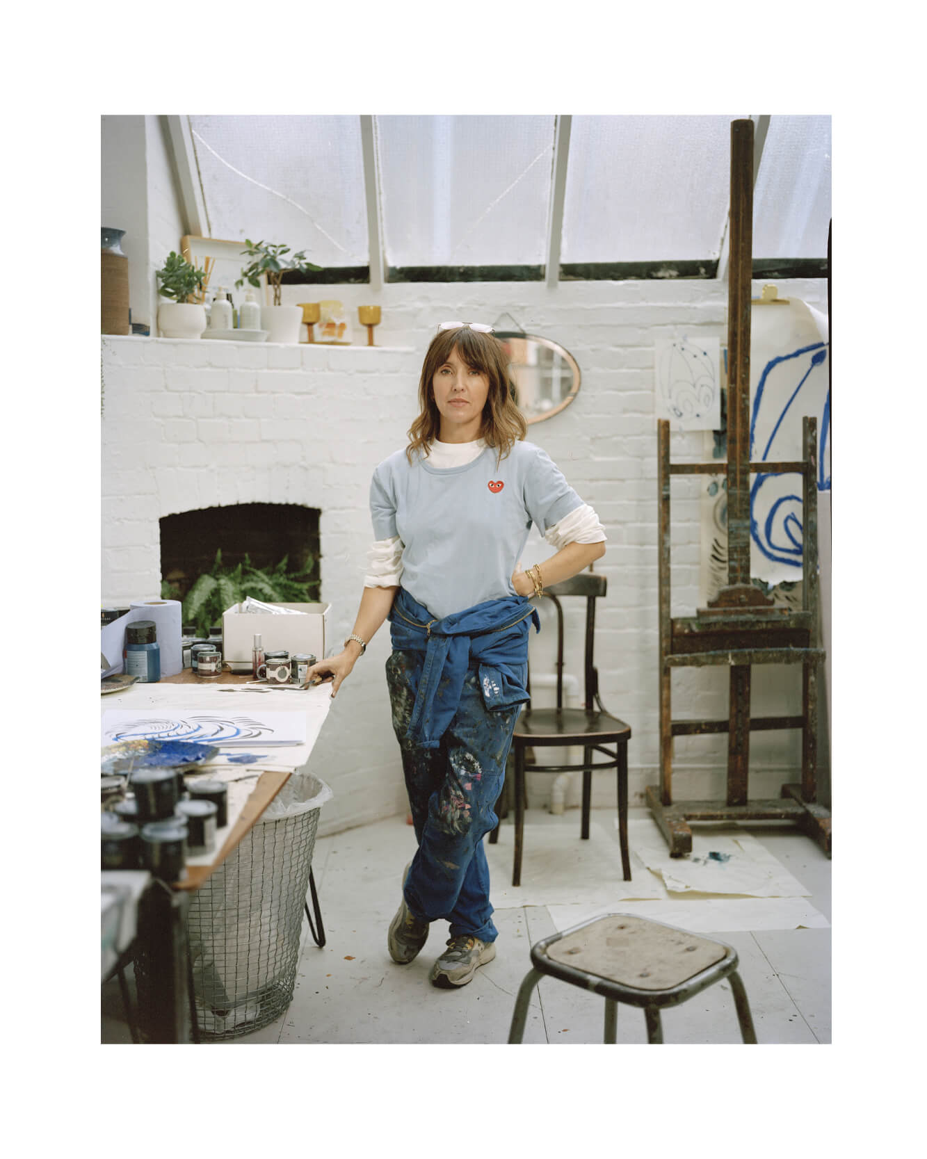 Portrait of artist and illustrator Caroline Tomlinson in her studio in London, Shoreditch. Shot on large format camera. 