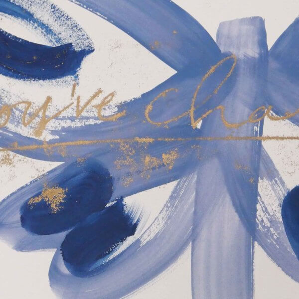 Blue brushstroke butterfly with deep navy wing markings and gold handwritten "you've changed - unfolding", original art by Caroline Tomlinson