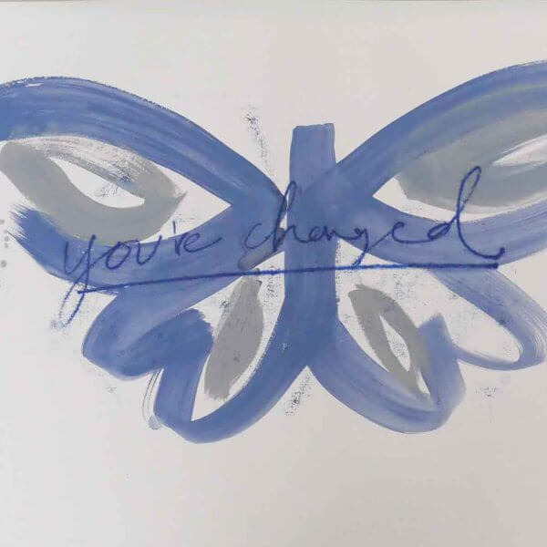 Blue brushstroke butterfly with taupe wing markings and handwritten "you've changed - letting go " in ultramarine, original art by Caroline Tomlinson
